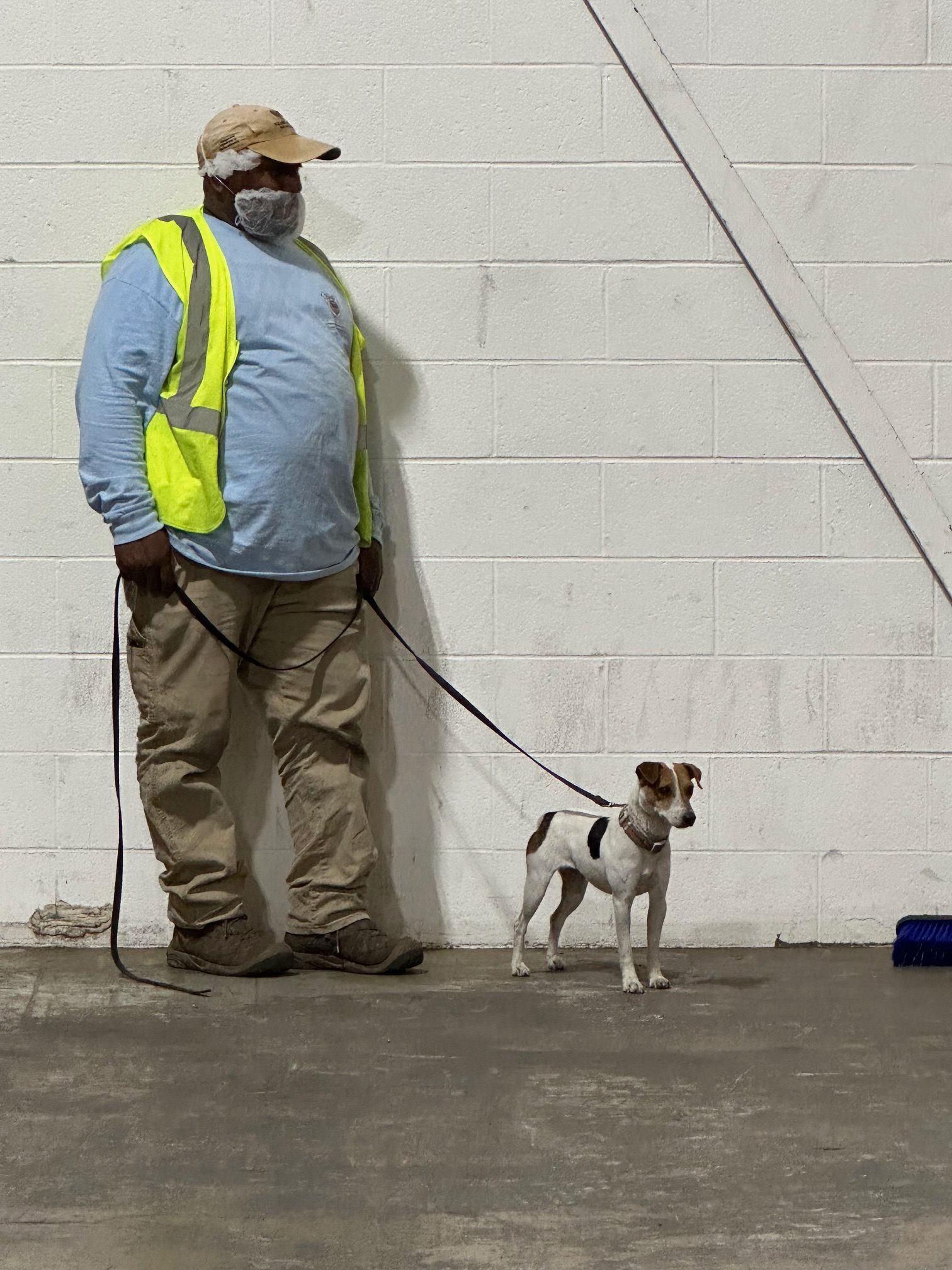 A certified K-9 team working a commercial account.